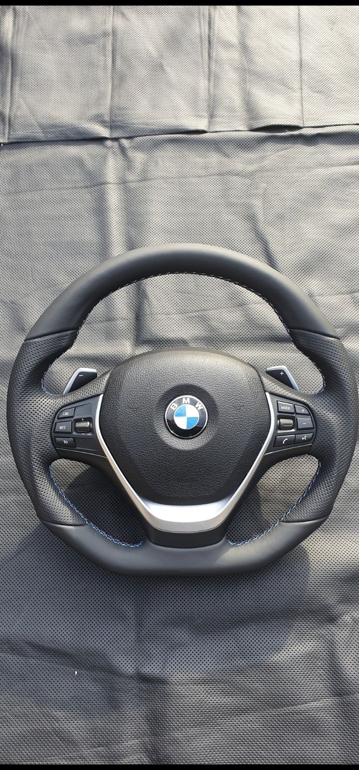 Volane ergonomice BMW, reducere pt Comenzi.