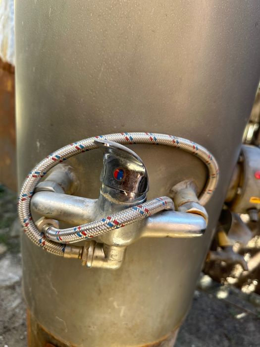 Комбиниран бойлер на твърдо гориво и ток