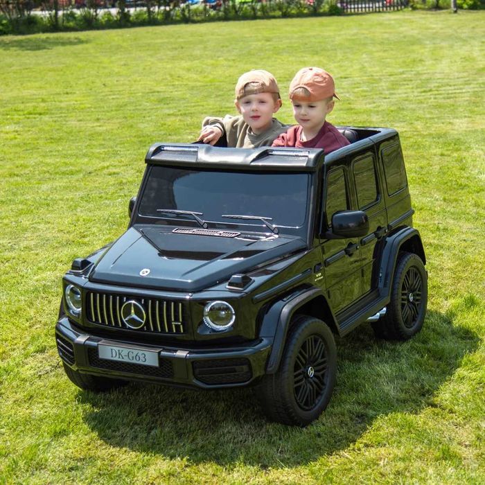 Двуместна джип G63 4X4 24V батерия,MP3, с меки гуми с Кожена седалка