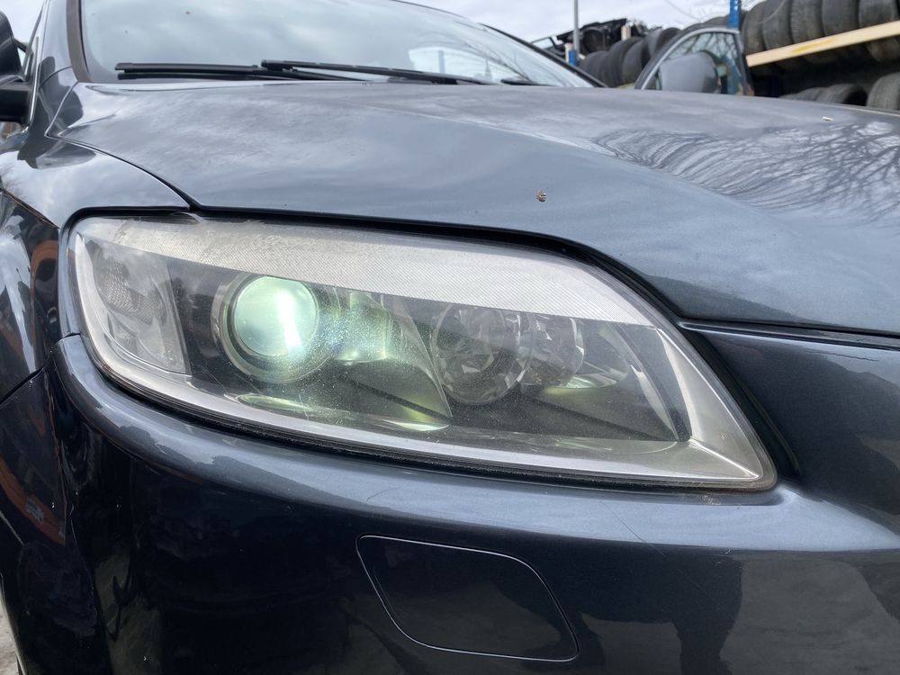Faruri Xenon St/Dr Audi Q7 (4L)Pret 1400 lei bucata in stare perfecta