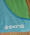 Bluză specială SKINS de compresie pentru sportivi