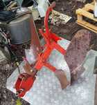 Plug motocultor reversibil