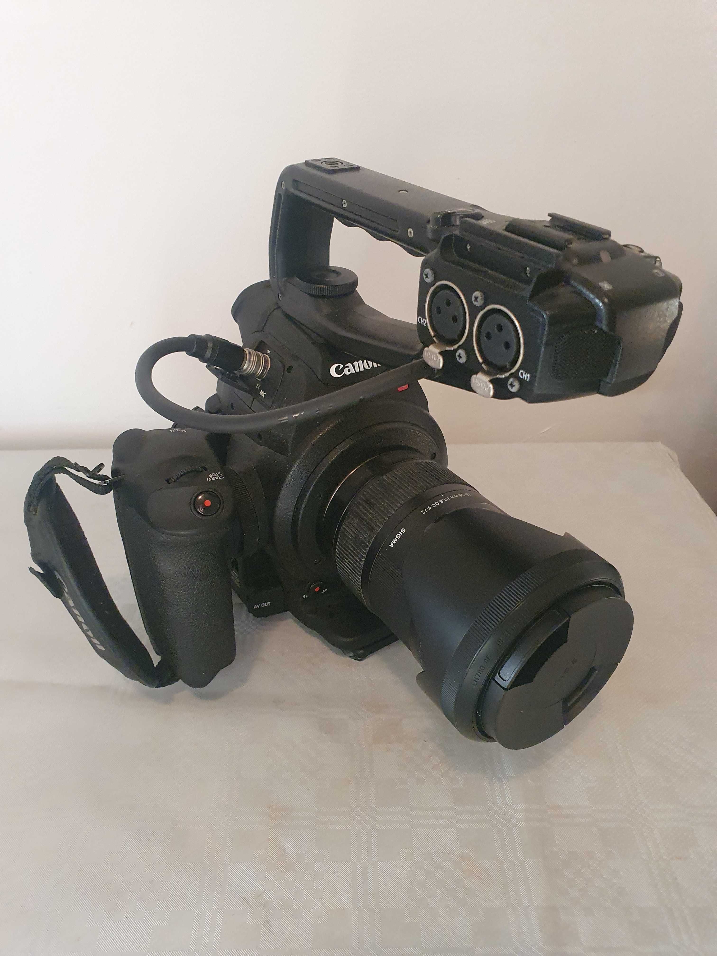 Vind camera Canon C100 DAF cu obiectiv sigma