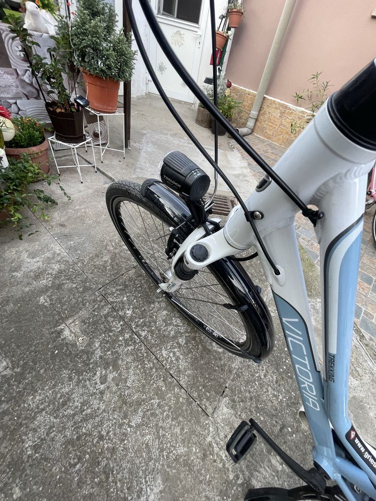 Bicicleta de dama cu suspensie