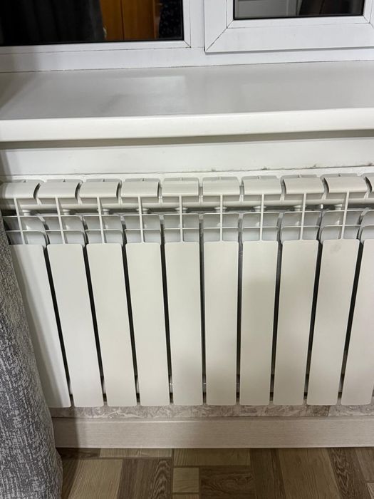 Продам Биметаллические батареи в целлофане, новые.