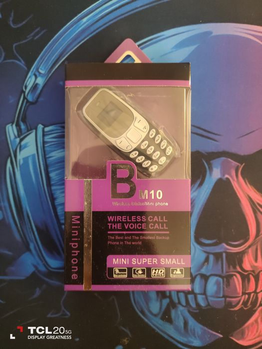 Мини GSM с две сим карти и Bluetooth