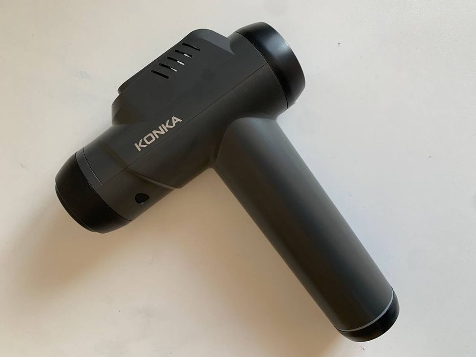 Массажёр .Массажный пистолет Konka с 2 насадками