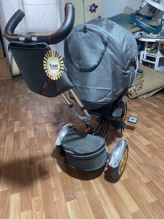 Прогулочная коляка велосипед