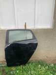 Usa spate stanga FORD FIESTA an 2009 - NEGRU