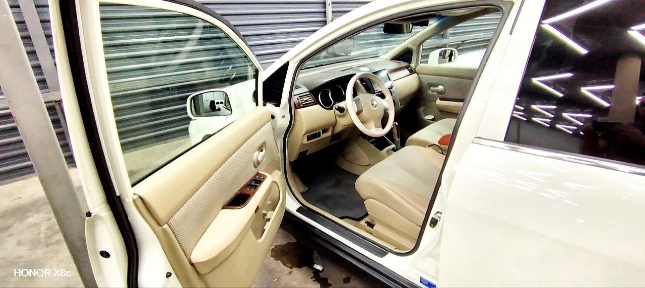 Nissan tiida 1.8 2008 йил холати идеалний