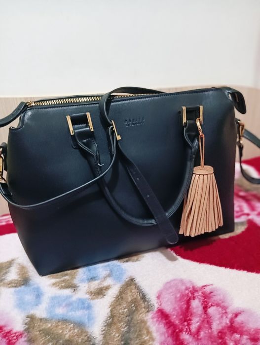 Vând ca geantă impecabila