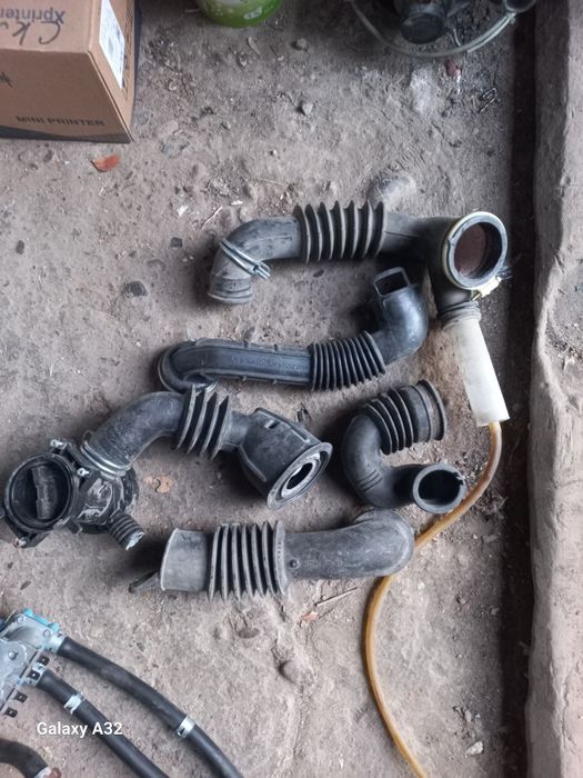 Патрубки для стиральных машин разные