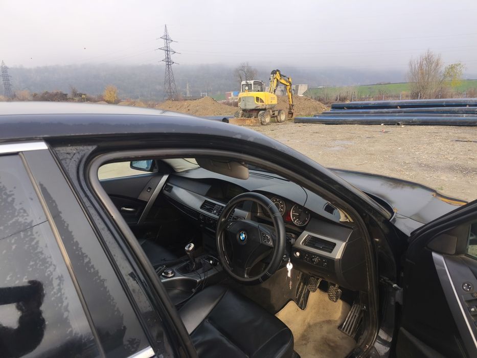 vând BMW E60 volan pe dreapta