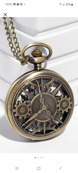 Часы кварцевые..длина цепочки 40см...диаметр 4.5см.