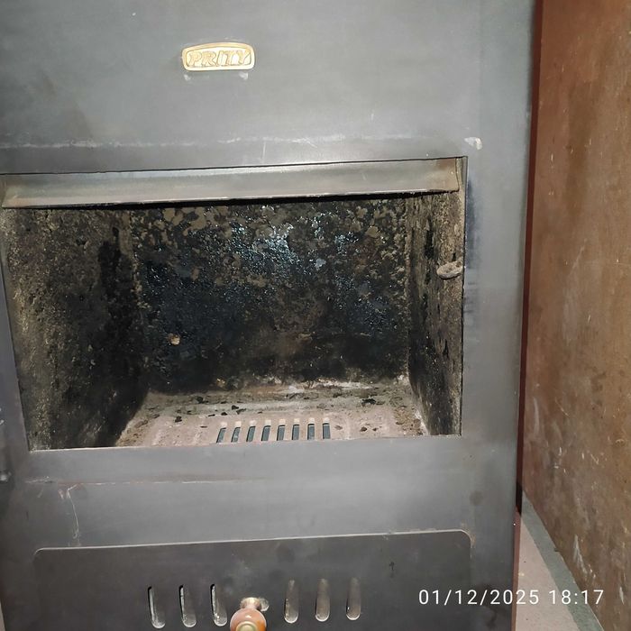 Продавам печка на твърдо гориво тип "камина" с водна риза ПРИТИ.