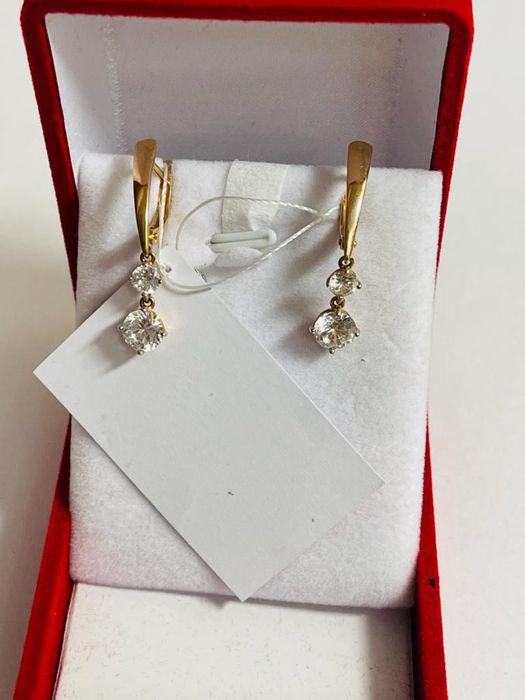 продам новые золотые серьги