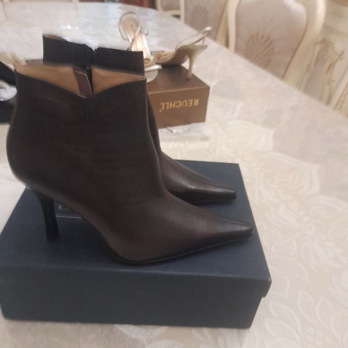 Продам новые сапоги