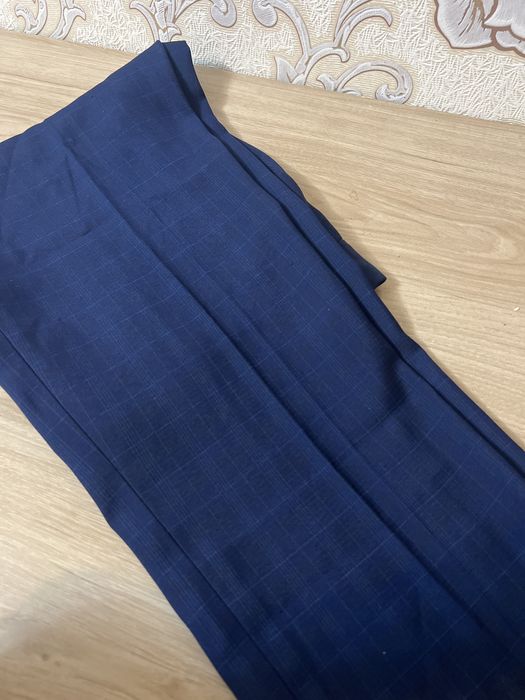 Көк түсті ,ерлерге арналған шалбар.Сапасы өте жақсы.