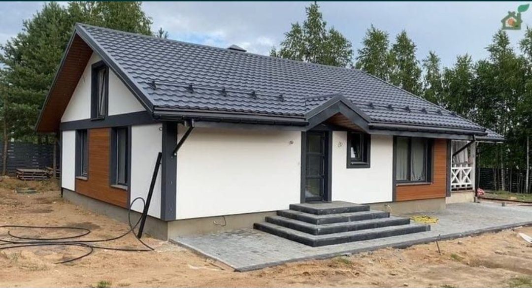 Vand casa pe structura metalica invelita cu panauri sendwici de dimins