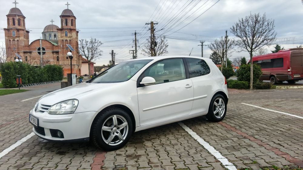 Vw golf 5 an 2009  1.4 benzina