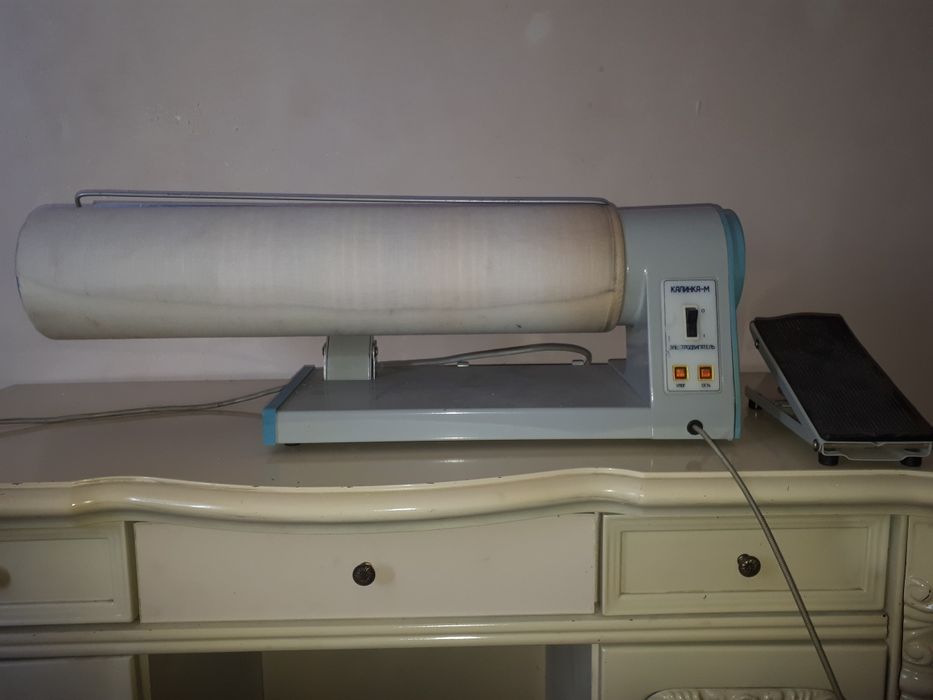 Гладильная машина.