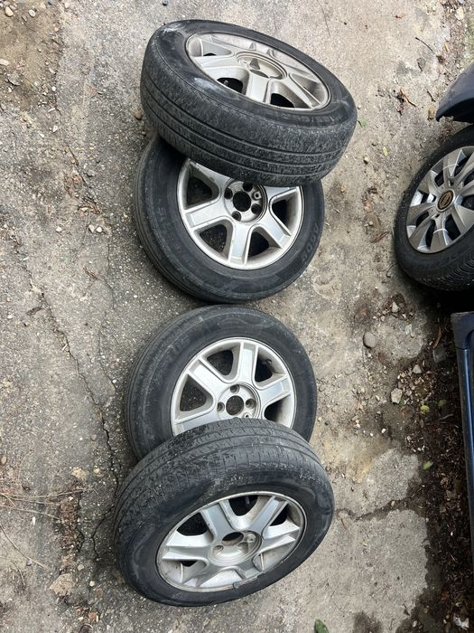 Jante Dacia 4x100 + anvelope vara 185 65 r15