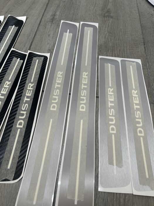 Ornamente protectie praguri Duster