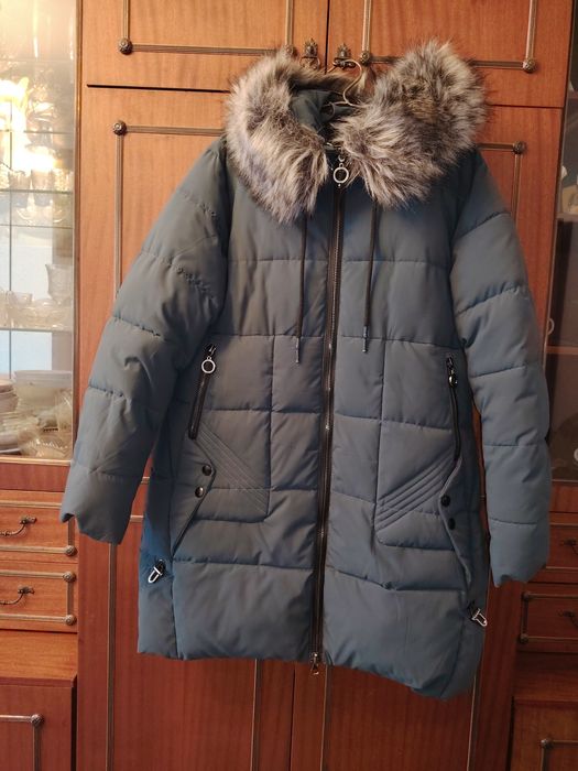 Срочно продам новый женский пуховик - 54размер,15000тн.