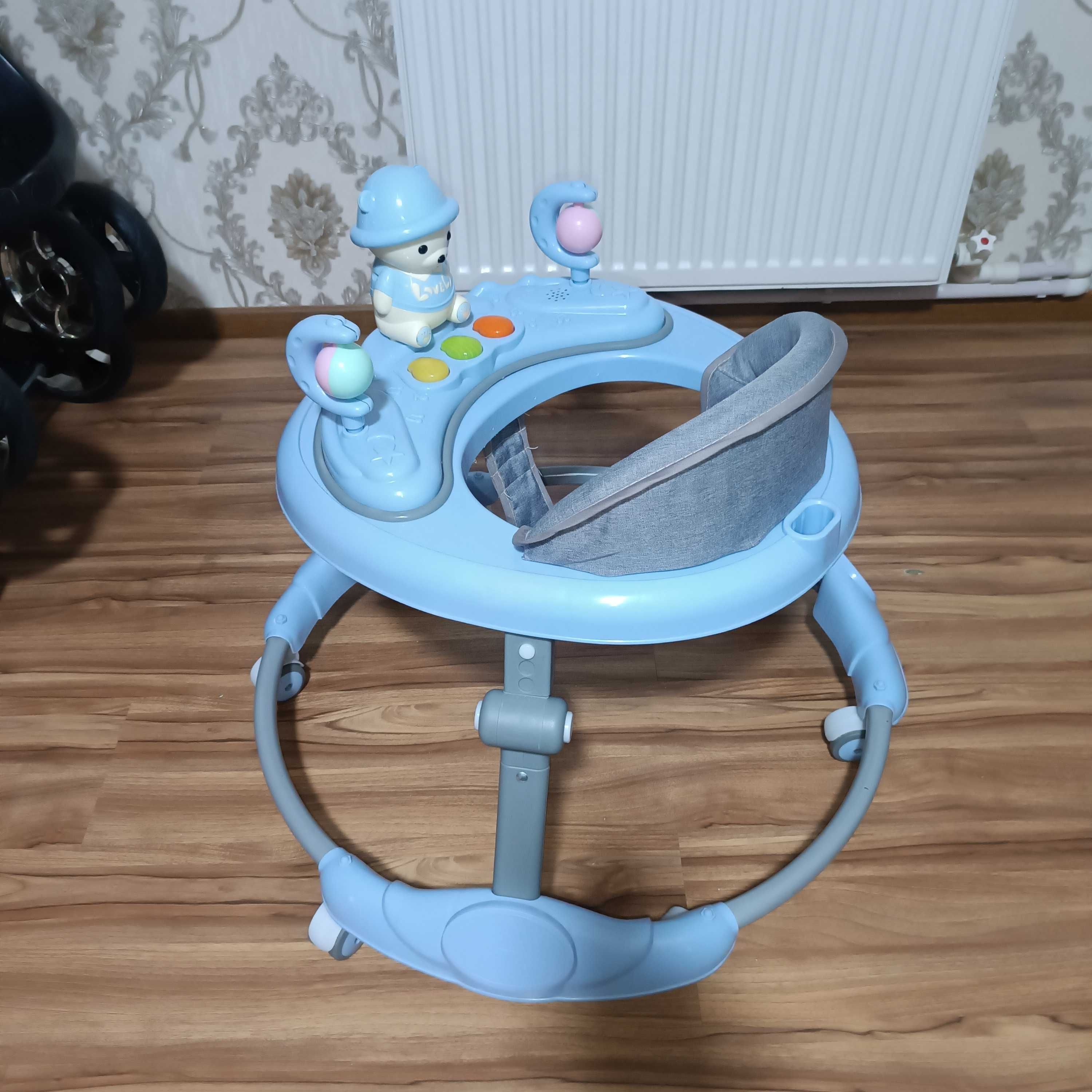Продам детскую коляску и ходунки