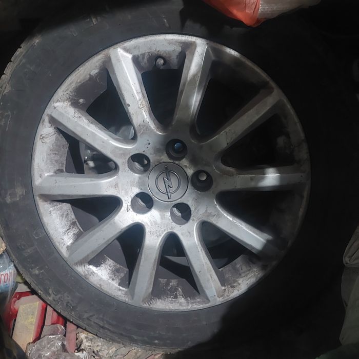 Продавам оригинални ляти алуминиеви джанти с гуми за Опел Зафира, Астр