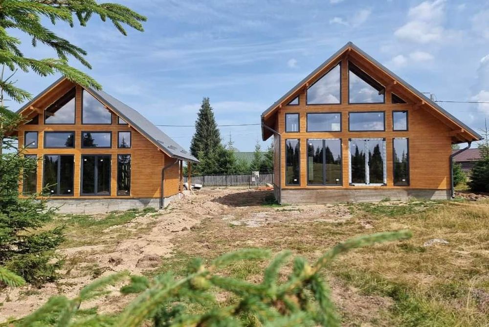 Case de vanzare pe structura de lemn