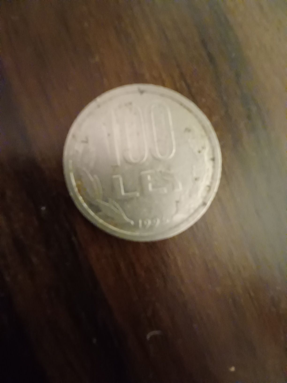 Vand moneda de 100 de lei