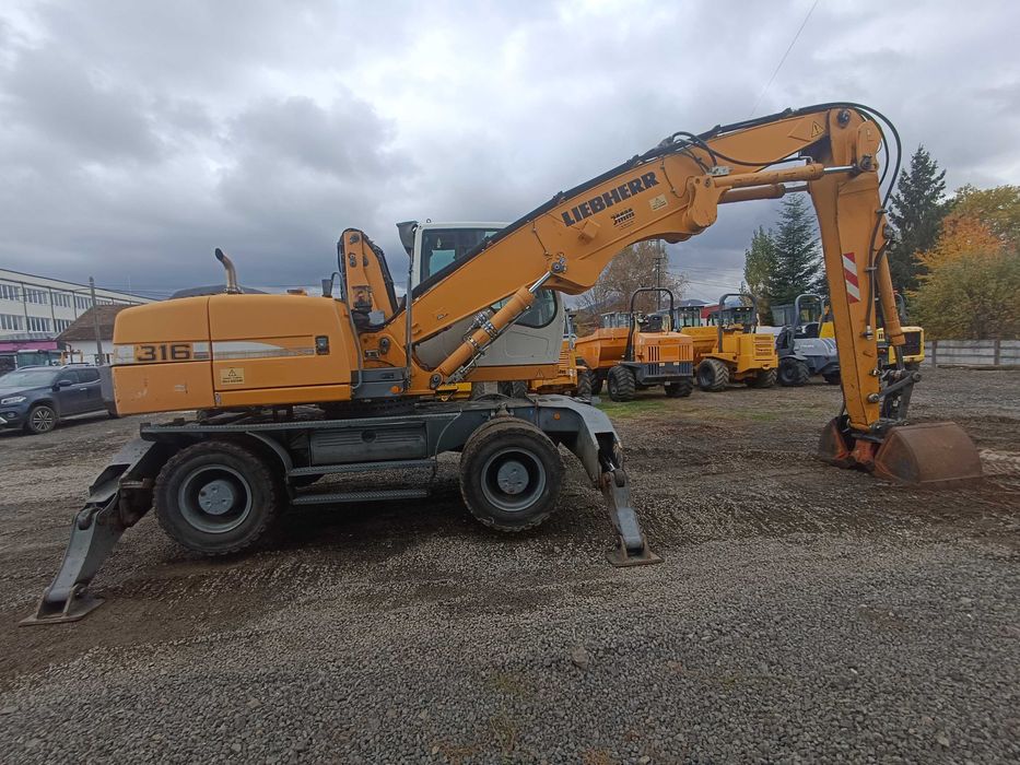 Excavator pe roti Liebherr A316, 21 tone, pentru manipulare, 2009