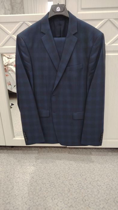 Мужской костюм 54р в идеальном состоянии.