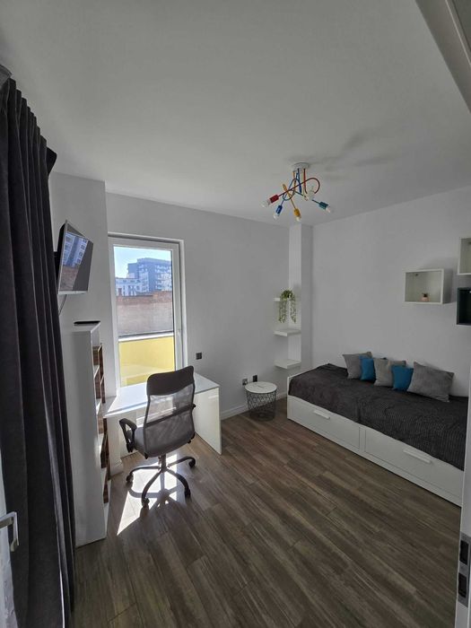 Se inchiriaza Ap. 2 camere + parcare subterana in zona centrala