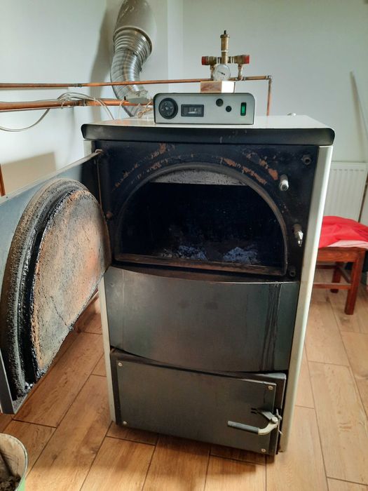 Vind centrala pe lemne