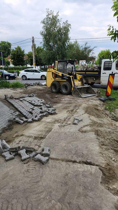 Bobcat ,cilindru compactor,Transport agregate Moloz