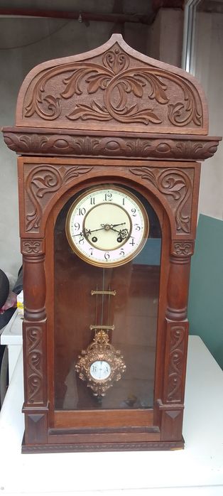 Ceas de perete cu pendul vechi