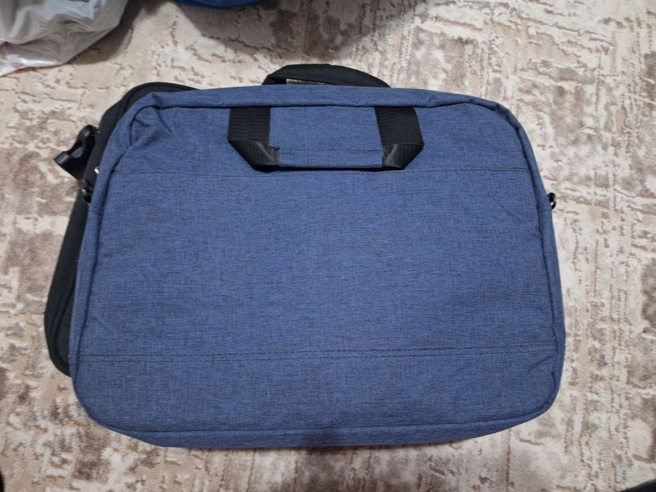 Geanti laptop noua