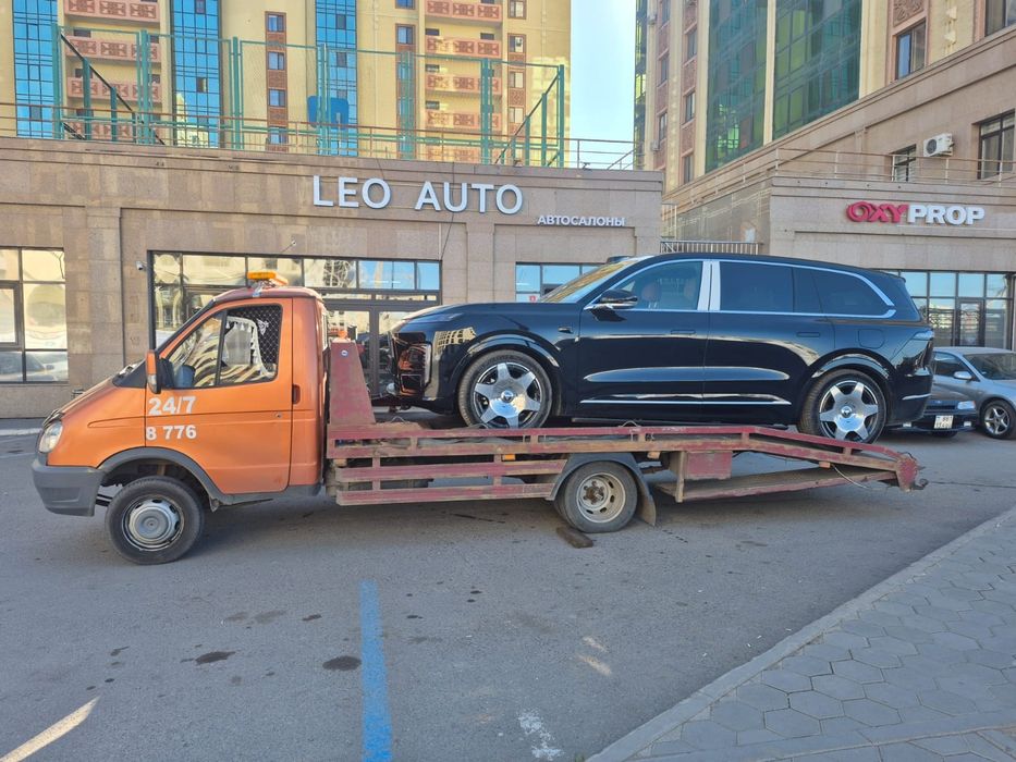 Услуги эвакуатор по городу астана и меж горд 24/7