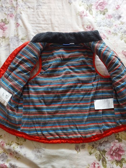 Детская жилетка в отличном состоянии.