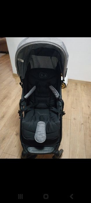 Cărucior gri aproape nou