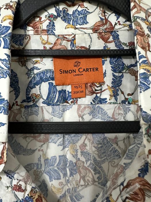 Риза Simon Carter