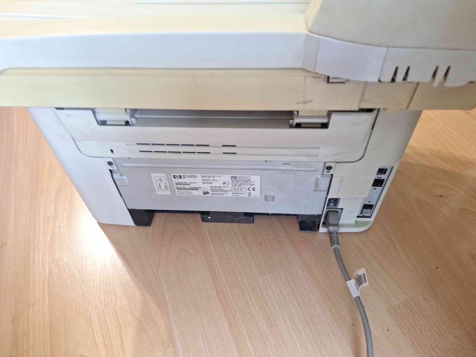 Лазерен принтер, копир, скенер, факс  МФУ HP Laserjet M1522NF