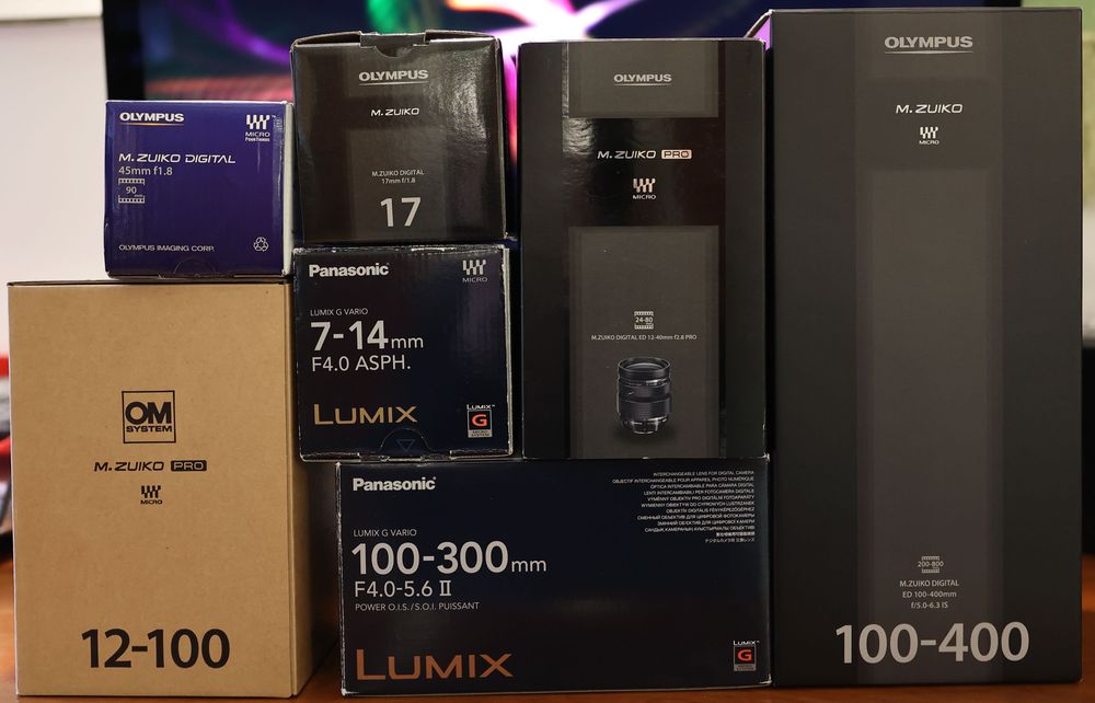 Obiective MFT Olympus și Panasonic puțin folosite, impecabile, ca noi.
