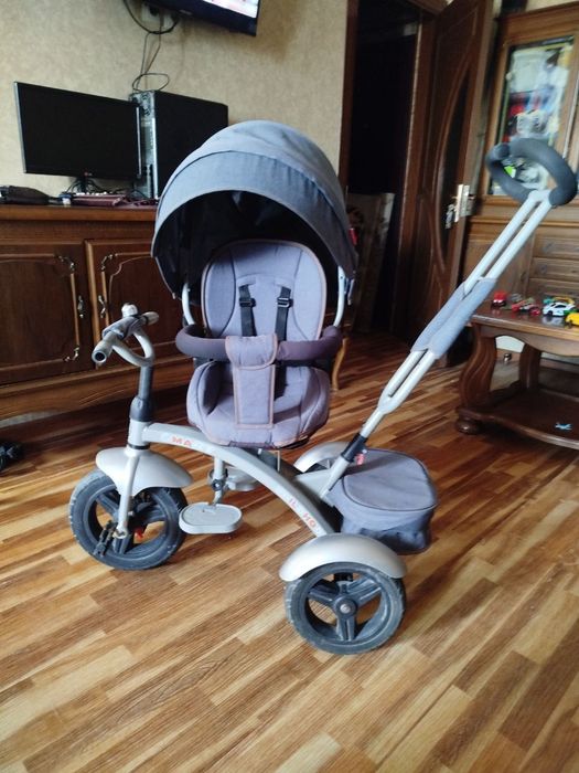 Детская вело коляска с поворотом сиденья.цена 350 тыс.