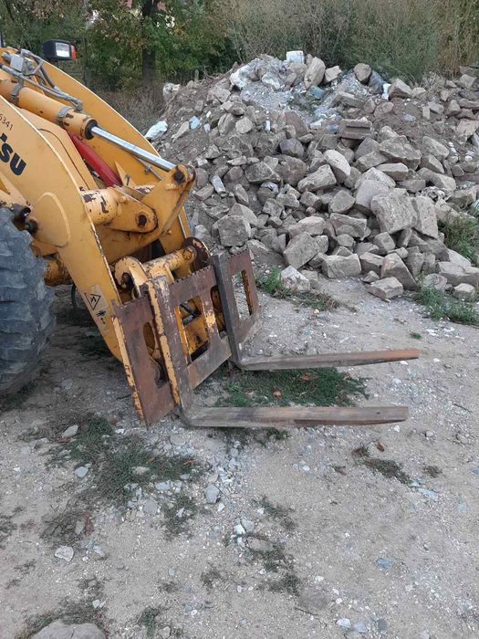 Багер Komatsu WB70A