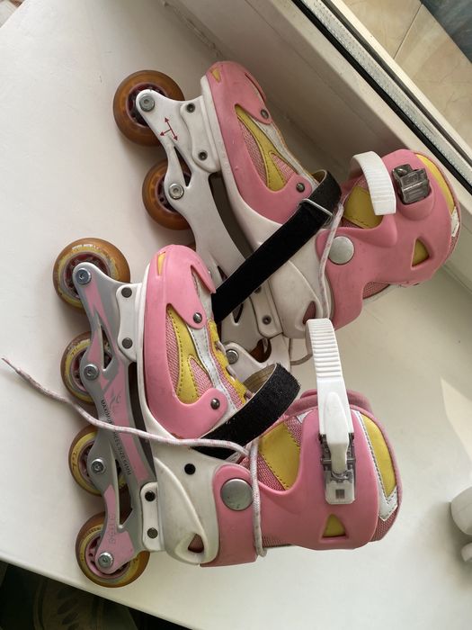 Ролики женские розовые