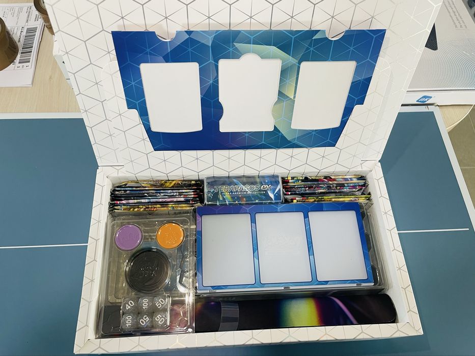 Cutii de Pokemon Desigilate