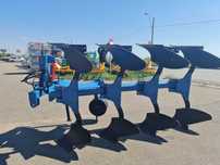 Plug agricol reversibil hidraulic cu 4 trupite Konig Traktoren